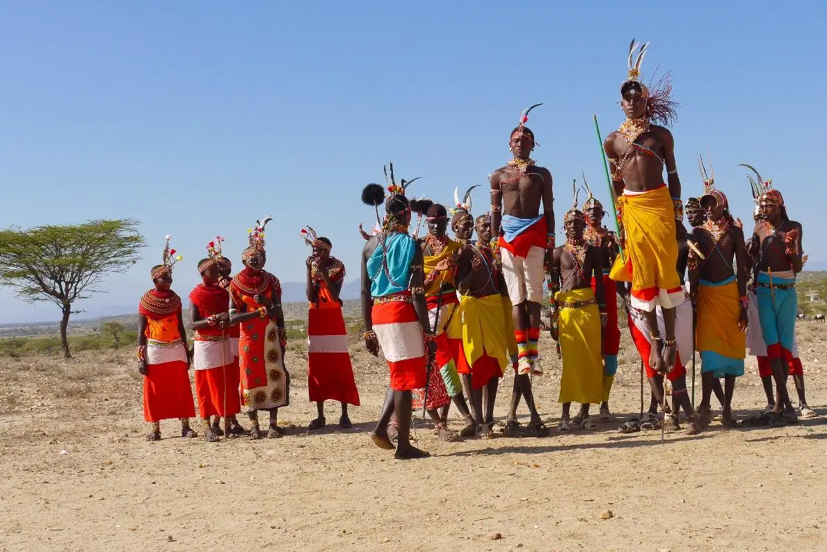 Samburu people in traditional attire performing a cultural dance in Samburu National Reserve