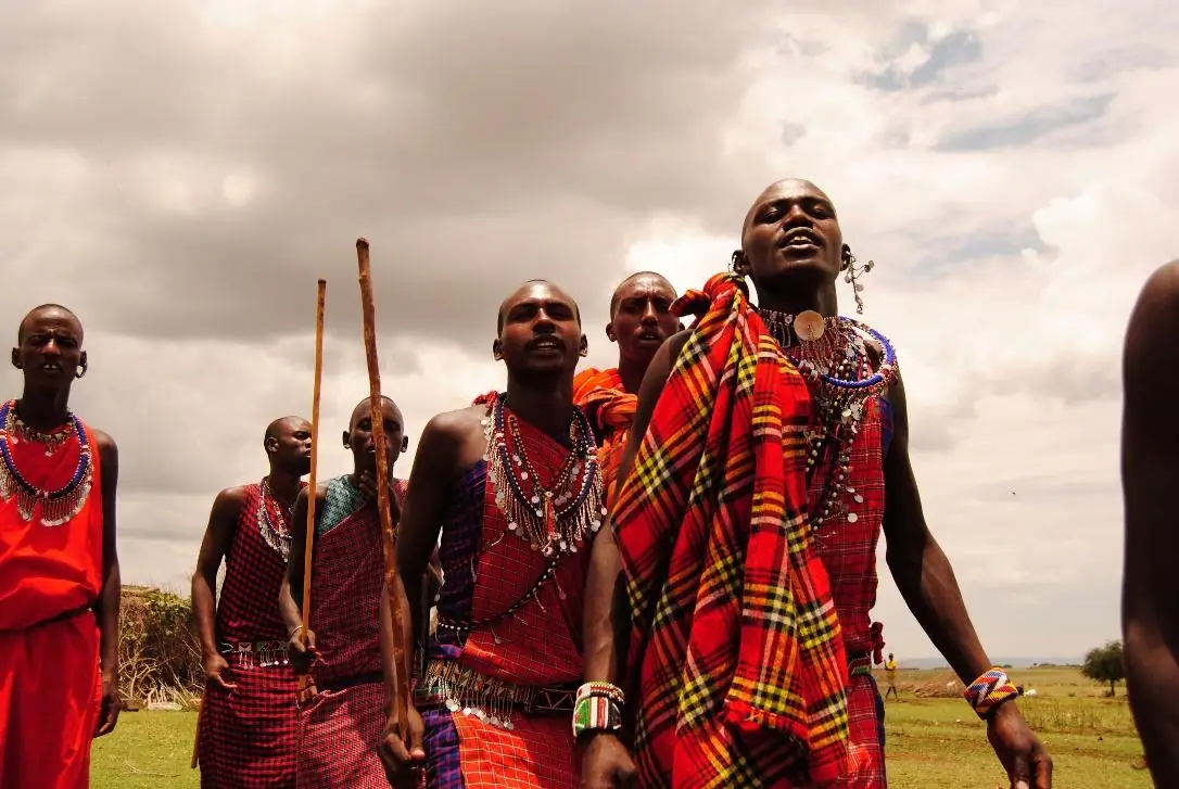 Maasai men in traditional attire at Masai Mara National Reserve