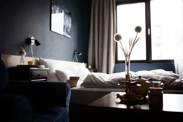 Luxury hotel room near Nairobi National Park with a cozy ambiance and elegant decor.