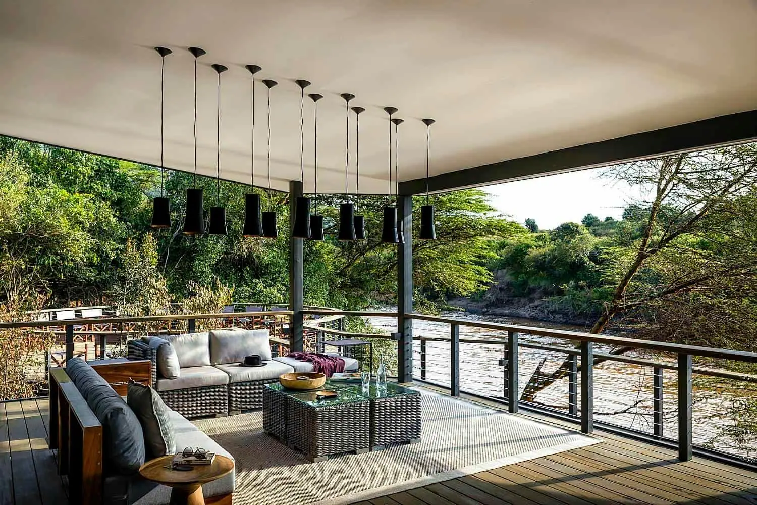 Riverfront deck at Sanctuary Olonana Camp in Masai Mara National Reserve